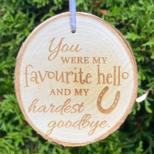 Pet memorial ornament with a saying and a horseshoe engraved on it.