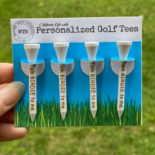 Custom golf tees with a funny saying engraved.