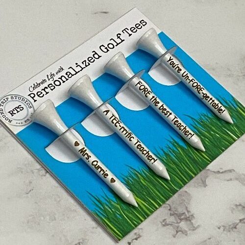 Engraved golf tees personalized for a special teacher.