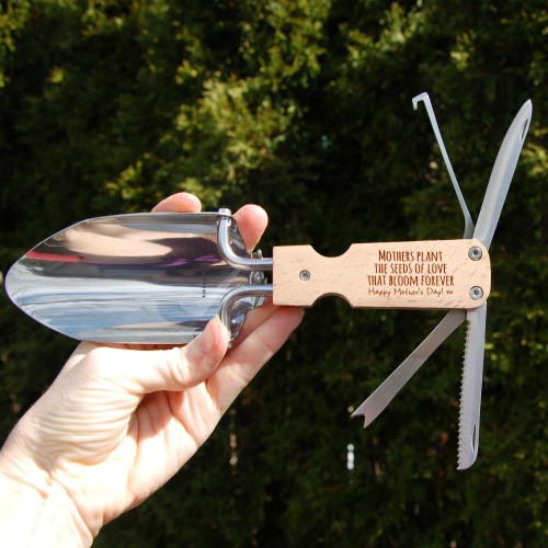 Garden multitool open showing all five tools and personalized handle. Example of how to create a personalized gift for gardeners.