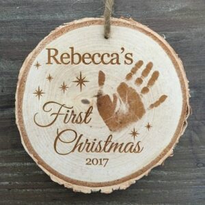 Rustic Birch Ornament with handprint engraved.