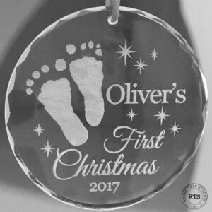 Crystal first Christmas ornament with footprints engraved.