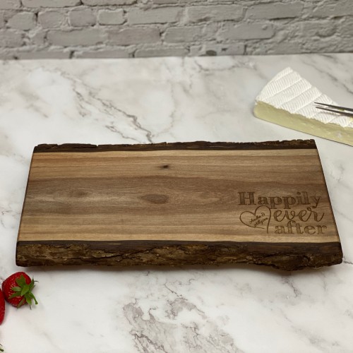Personalize your charcuterie board with Happily Ever After engraved on it.
