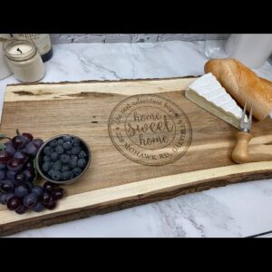 Live edge charcuterie board personalized for a housewarming gift.