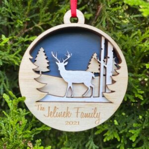 Custom reindeer Christmas ornament made with layered wood.