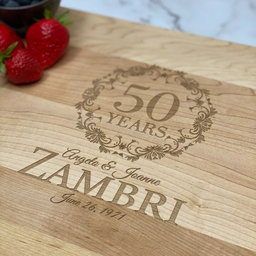 Personalized wood cutting boards made in Canada engraved with a popular design for anniversary gifts.