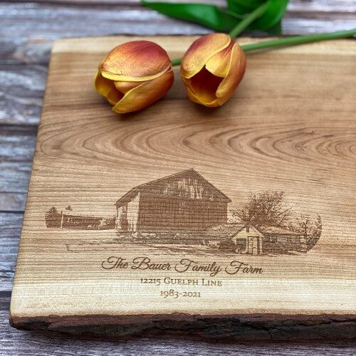 Real estate photograph engraved on a charcuterie board are a custom order.