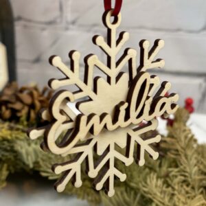 Custom Christmas ornaments made in Canada, laser cut snowflake and name.