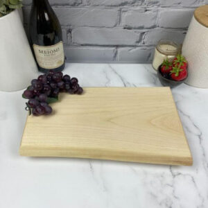 Maple charcuterie board would look great with a housewarming design.