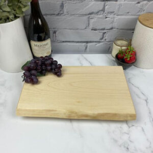 Maple charcuterie board would make a great gift for clients.