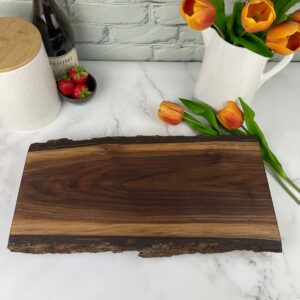 Medium walnut charcuterie board that can be personalized.