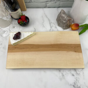 This beautiful maple charcuterie board has lovely grain pattern.