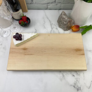 This maple cheeseboard can be engraved in the center or the bottom corners.