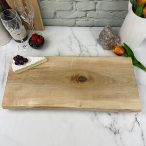 A beautiful maple charcuterie board ready for your design.