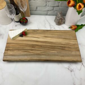 Large maple charcuterie board with lots of character.