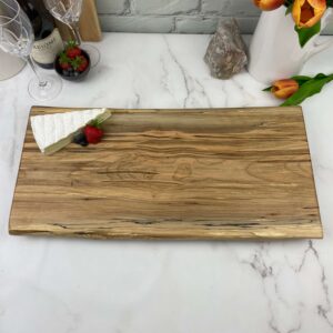 Large maple cheeseboard with a beautiful grain pattern.